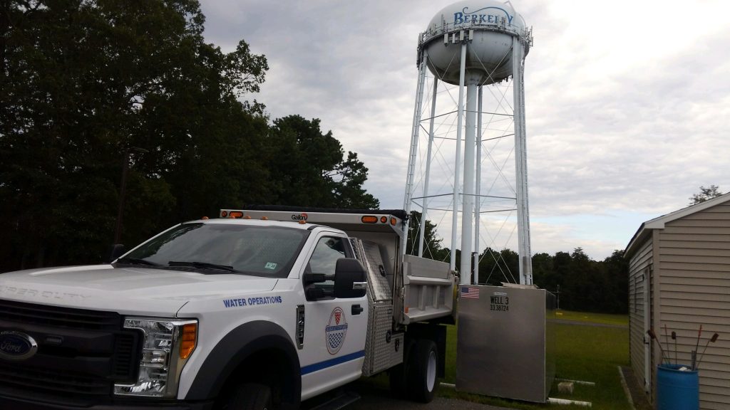 Logo Berkley MUA truck and water tower